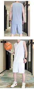 Detail of grey and white breathable basketball jersey set with side stripes and mesh texture