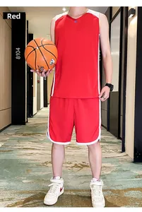 Detail view of red and white basketball uniform set with V-neck jersey and striped shorts