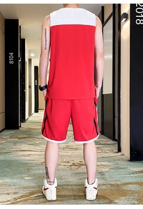Rear view of men's breathable basketball uniform set with red and white color blocking
