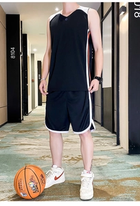Detail of black basketball jersey set with contrast stripes and breathable mesh fabric