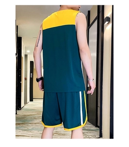 Rear view of men's dark green basketball jersey set with yellow accents and mesh fabric