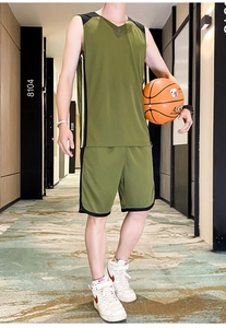 Close-up of olive green basketball uniform featuring breathable mesh and side stripe details
