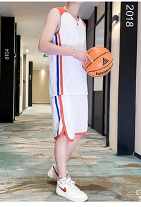 Detail of men's white basketball set with red and blue side stripes and breathable mesh