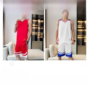 Detail view of quick-dry mesh basketball jersey and shorts set in red and white colors