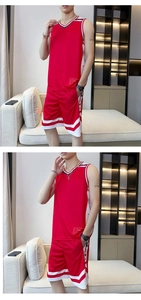 Detail of red quick-dry basketball jersey with breathable mesh fabric and white stripes