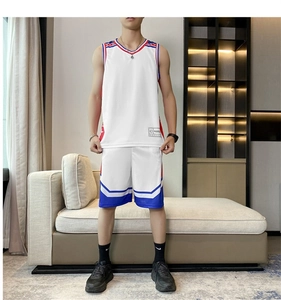 Detail view of quick-dry basketball jersey set with athletic side stripes and sport logo