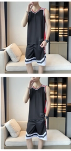 Detail of breathable quick-dry mesh fabric on men's black basketball jersey set