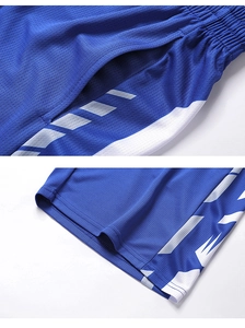 Detail of navy blue mesh shorts featuring breathable fabric and athletic side pocket