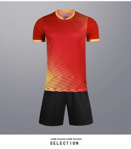Detail of breathable football jersey with red and yellow gradient and geometric patterns