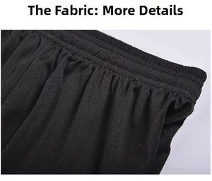 Detail of breathable mesh fabric and elastic waistband on black soccer shorts