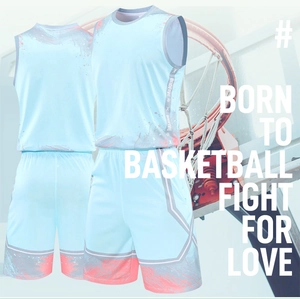 Detail of light blue basketball jersey and shorts with orange splash pattern and Badfive tape