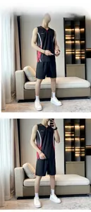 Detail of men's quick-dry black sports set with side gradient stripes and SPORT logo
