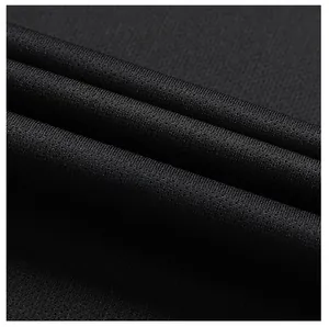 Macro detail of black ice silk fabric showing breathable mesh texture and stretch