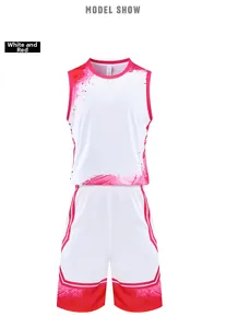 Close-up of white and red basketball set featuring gradient spray ink design and mesh fabric