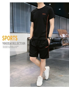 Vue détaillée de l'ensemble de sport noir avec rayures orange et lettrage SPORTS