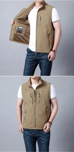 Detailed view of khaki fishing vest showing breathable mesh lining and multiple zip pockets
