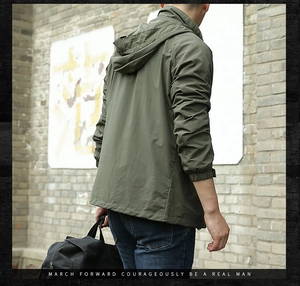 Outdoor hooded windbreaker for men in army green featuring adjustable hood and elastic cuffs