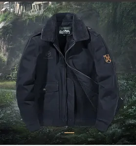 Close-up of navy blue winter jacket with fleece collar and embroidered chest badge