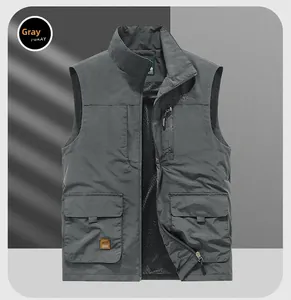 Detail of dark gray outdoor vest with multi-pocket design and breathable mesh lining