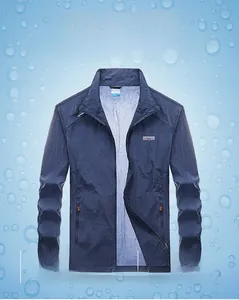 Detail view of navy blue outdoor jacket showing breathable fabric and zipper collar
