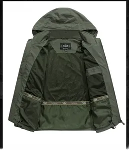 Detail view of army green hooded jacket showing breathable mesh lining and fashion tape