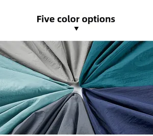 Detail shot of five breathable fabric samples in various shades of blue and grey