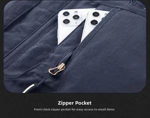 Detail of chest zipper pocket on outdoor vest holding two smartphones for capacity