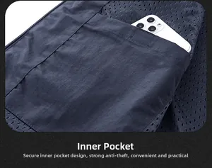 Detail view of inner mesh pocket with white smartphone to show anti-theft storage