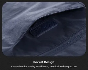 Detail of multi-pocket vest showing zip closure and velcro pocket for outdoor storage
