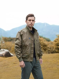 Men's olive green MA-1 bomber jacket with military patches and ribbed stand collar