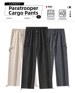 Detail of lightweight quick-dry cargo pants with elastic drawstring waist and side pockets