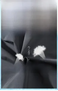 Breathable tech fabric detail of grey tactical parachute pants with cooling texture