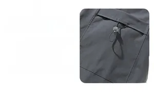 Detail of cargo pocket and elastic drawstring with buckle on men's gray ice silk trousers