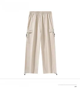 Rear view of apricot quick-dry tactical pants with drawstring waist and cargo pockets