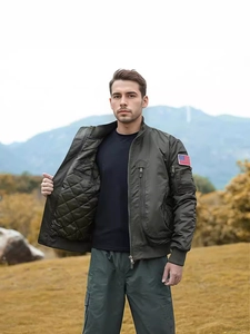 Olive green military flight jacket with diamond quilted lining and sleeve flag patch