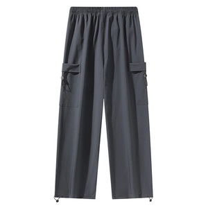 Men's loose ice silk cargo pants in dark grey featuring an elastic waist and side pockets