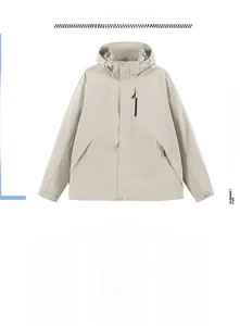 Close-up of windproof hood and adjustable drawstring on a light grey outdoor jacket