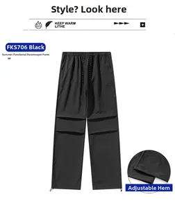 Men's black quick-dry parachute pants with adjustable drawstring hem and pleated knees