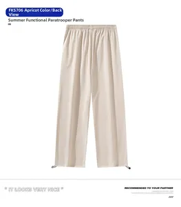 Rear view of apricot quick-dry sports trousers featuring drawstring hem and elastic waist