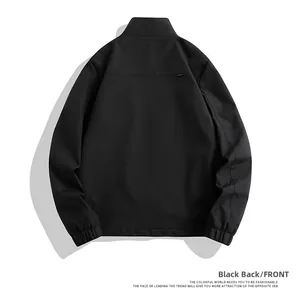 Rear view of a black men's casual jacket featuring elastic cuffs and a minimalist yoke