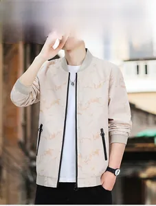 Detail of men's bomber jacket with beige marble pattern, zip pockets and ribbed cuffs