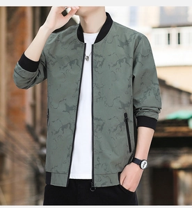 Close-up of bomber jacket collar and shoulder with green marble texture and zipper detail