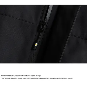Detail of windproof double placket and metal zipper with daisy charm on black jacket
