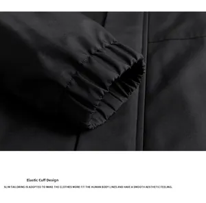 Detail of elastic ribbed cuffs on a black slim fit men's jacket with smooth texture