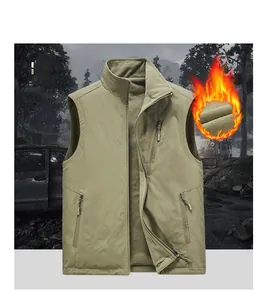 Detail view of the khaki fleece vest featuring three zipper pockets and windproof high collar