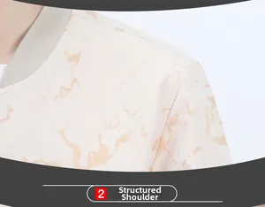 Detail of sturdy shoulder construction and marble print on the baseball collar jacket