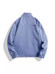 Back view of light blue men's casual work jacket with stand collar and elastic cuffs
