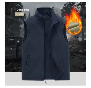 Detail of reversible navy blue fleece vest showing thick lining and zipper closure