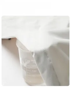 Close-up of white breathable waterproof fabric with steam showing high ventilation
