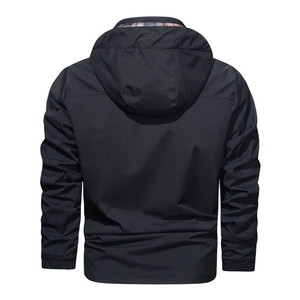 Rear view of black hooded jacket featuring a stylish colorful plaid lining in the hood